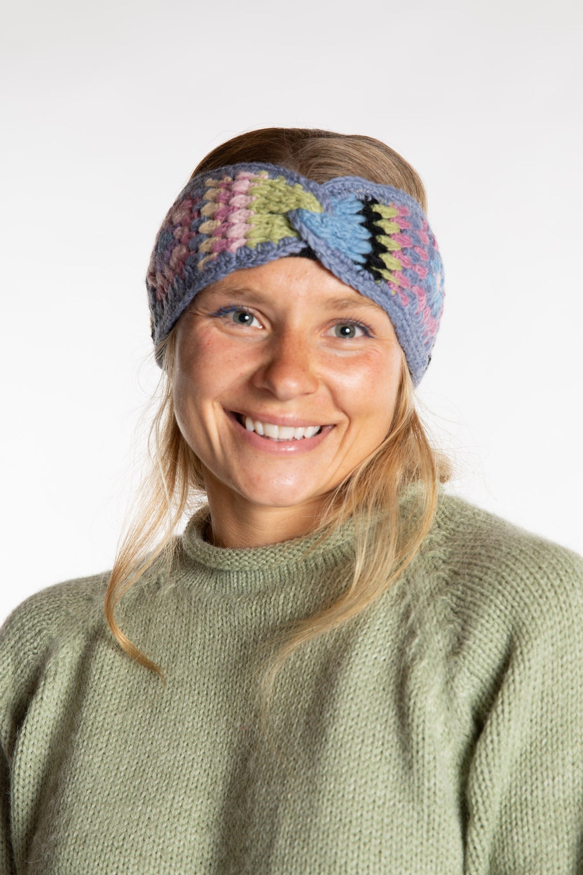 Sophie is wearing the Granny Square Wool Headband in Lavender