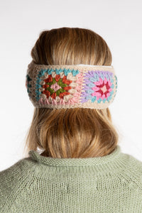 Sophie is wearing the Granny Square Wool Headband in Natural