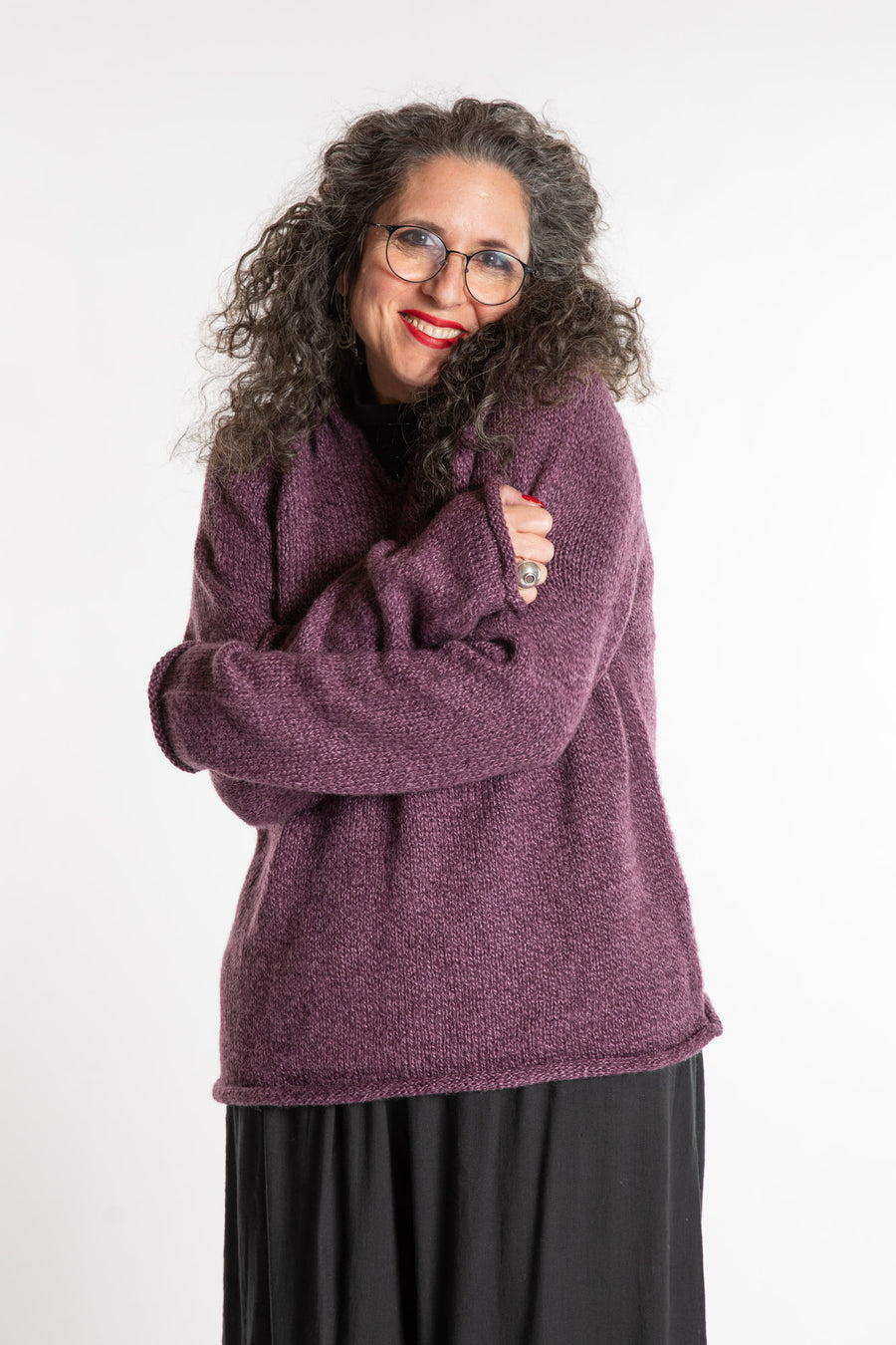  Susan is wearing a medium Hooded Alpaca Wool Sweater in Plum