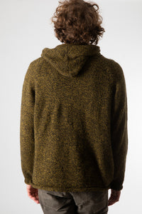 Ryan is wearing size L alpaca hoodie in bumblebee