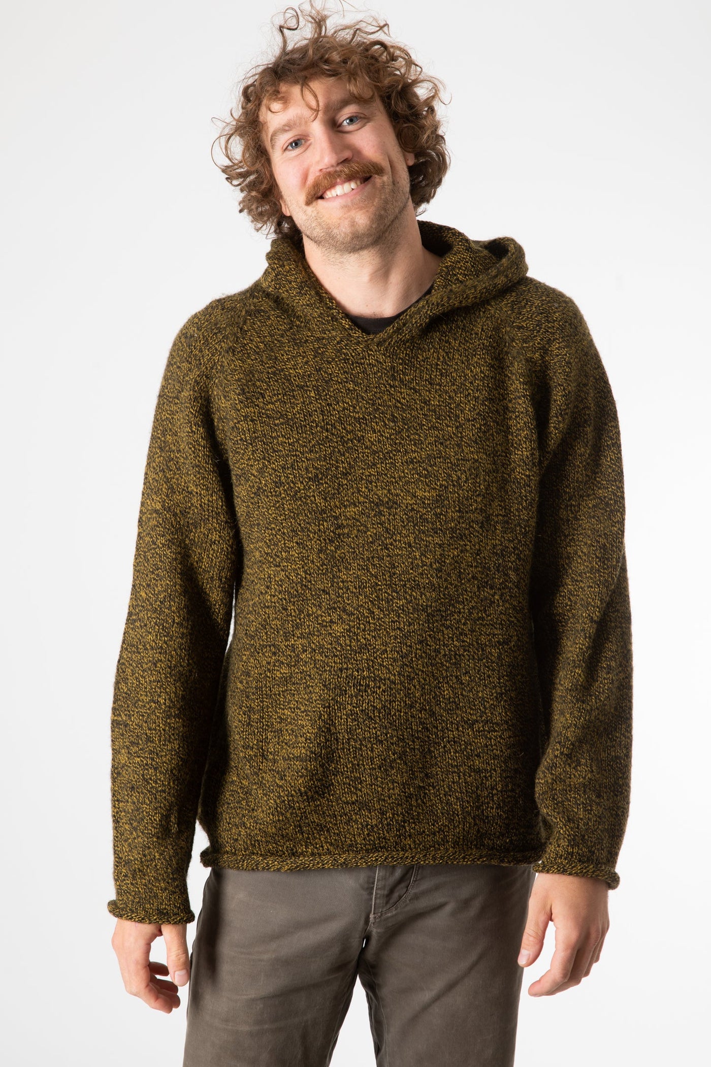 Ryan is wearing size L alpaca hoodie in bumblebee