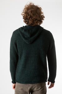 Ryan is wearing size L alpaca hoodie in forest