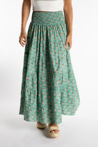 Sophie is wearing the one size Indira Printed Prairie Skirt in Aquamarine