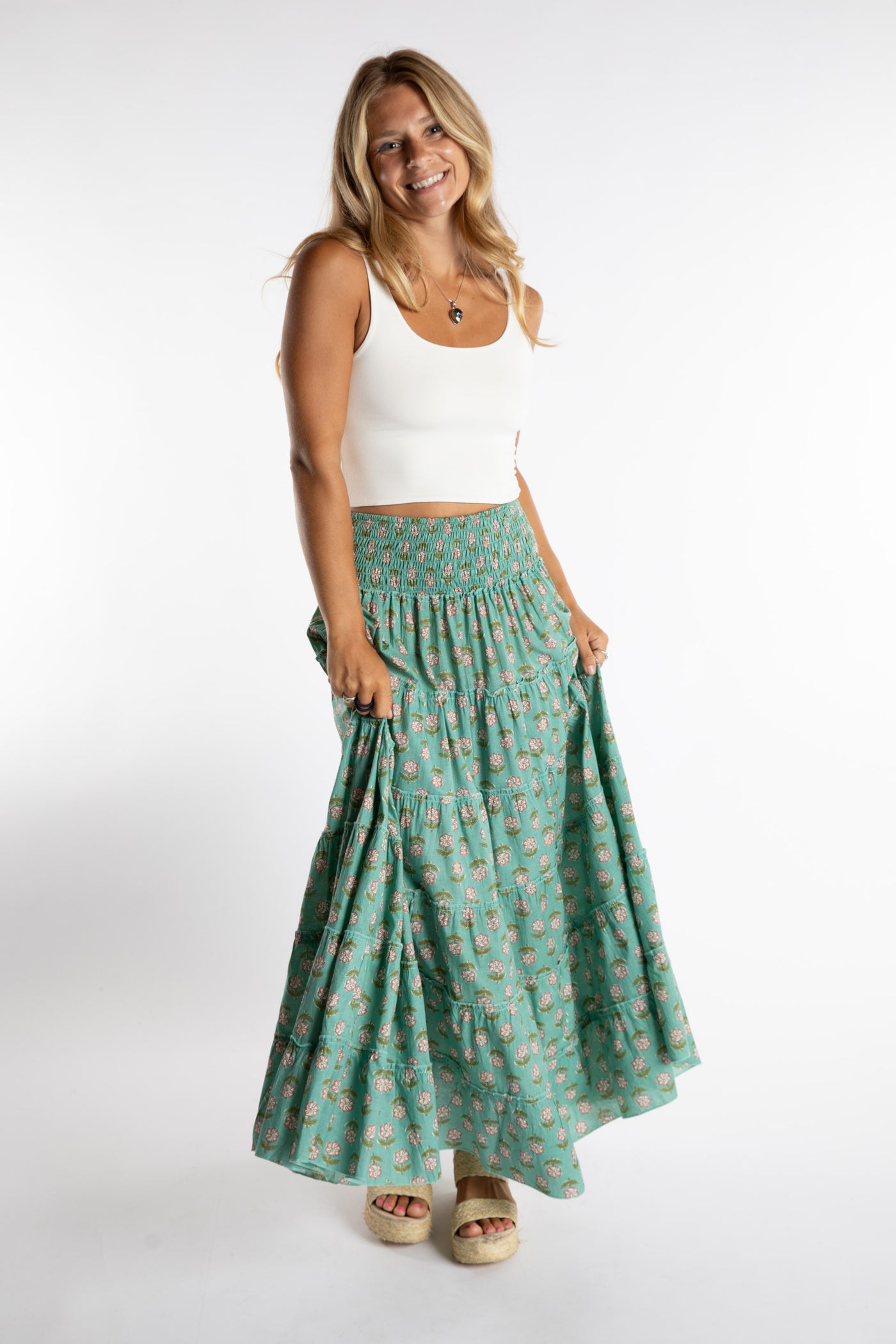 Sophie is wearing the one size Indira Printed Prairie Skirt in Aquamarine