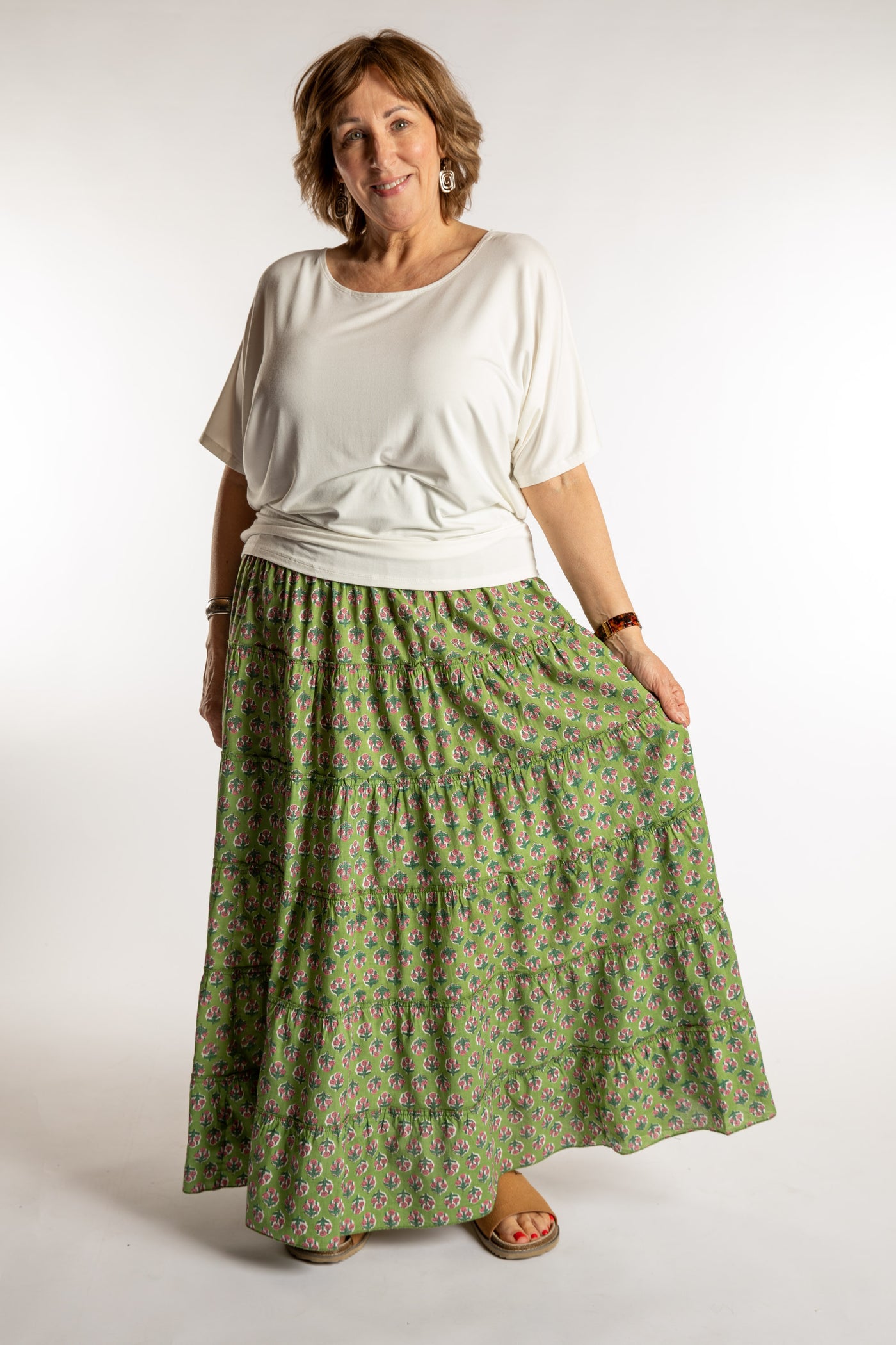 Betty is wearing the one size Indira Prairie Skirt in Avocado