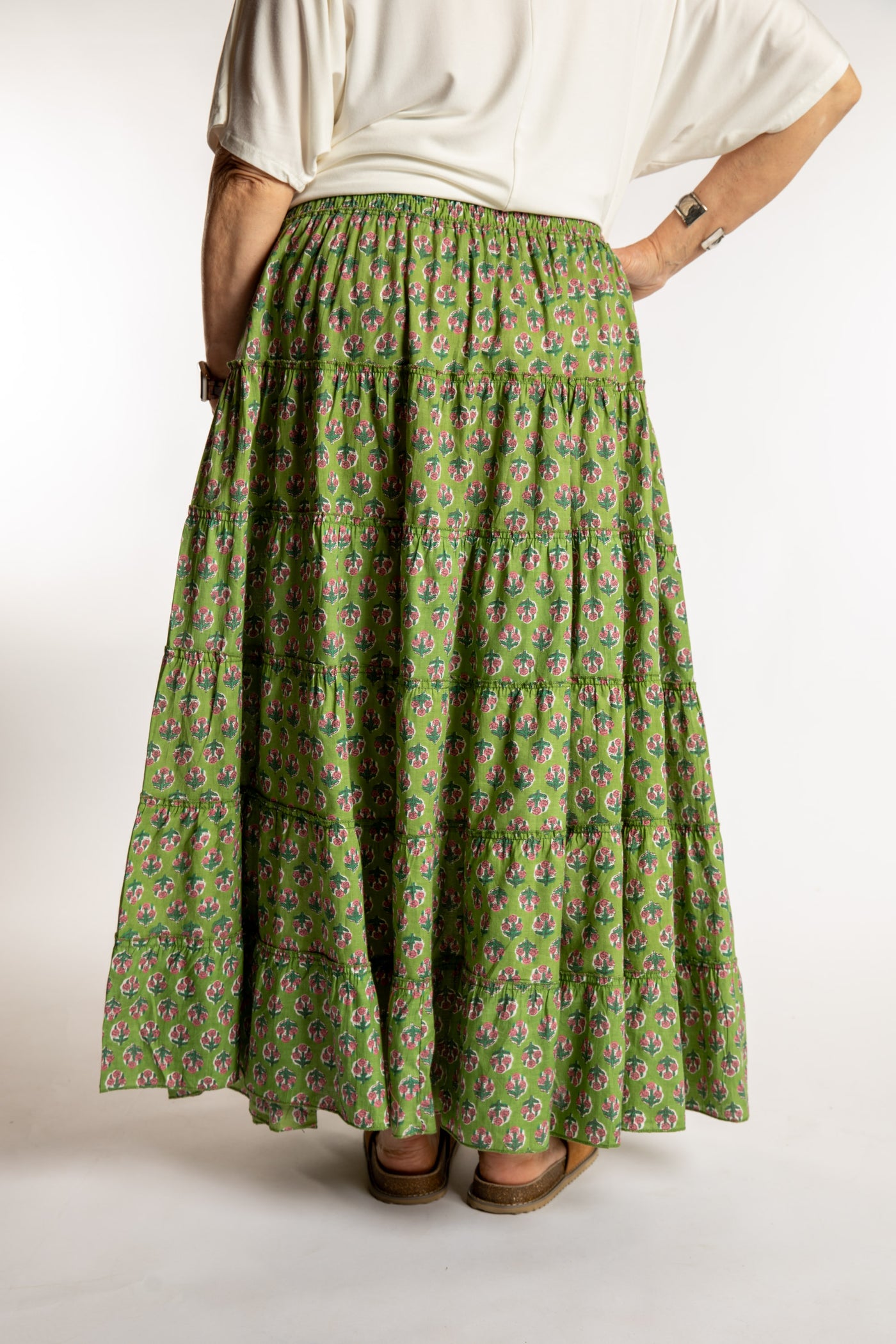 Betty is wearing the one size Indira Prairie Skirt in Avocado