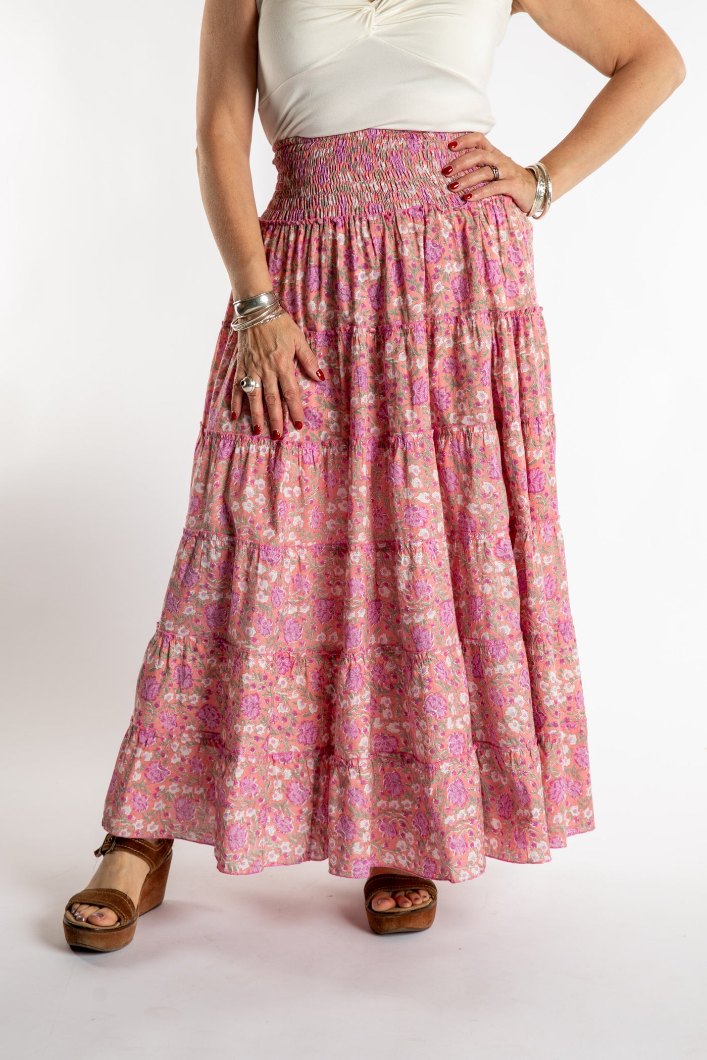 Susan is wearing the one size Indira Prairie Skirt in Blush