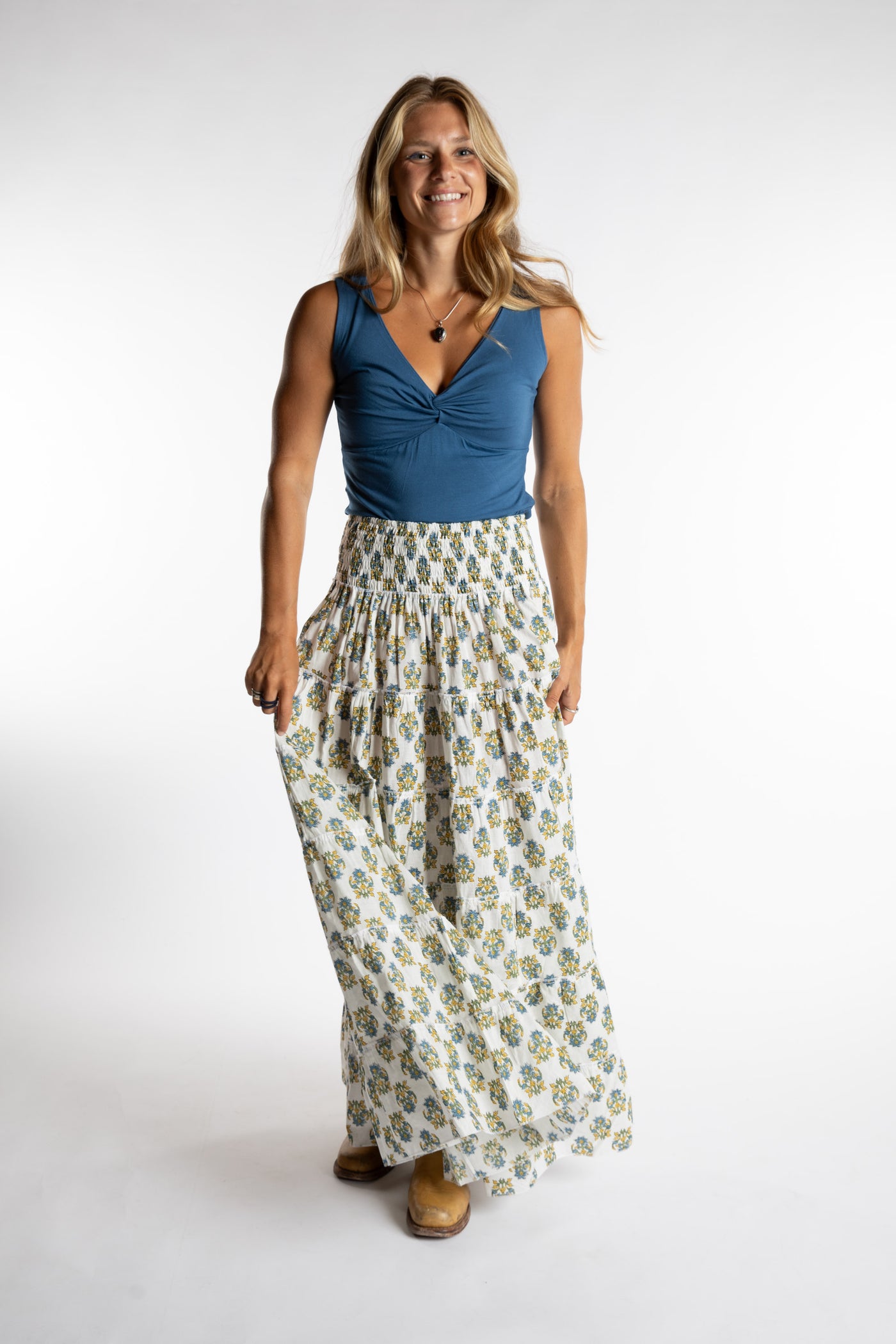 Sophie is wearing the one size Indira Printed Prairie Skirt in Bouquet