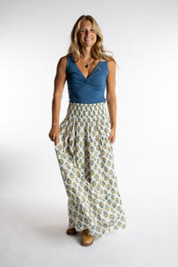 Sophie is wearing the one size Indira Printed Prairie Skirt in Bouquet