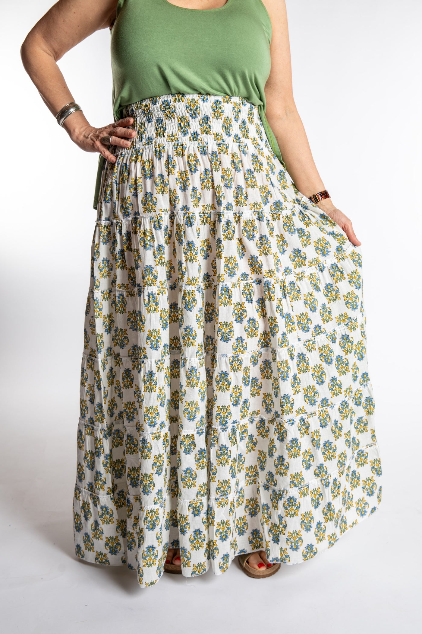 Betty is wearing the one size Indira Prairie Skirt in Bouquet