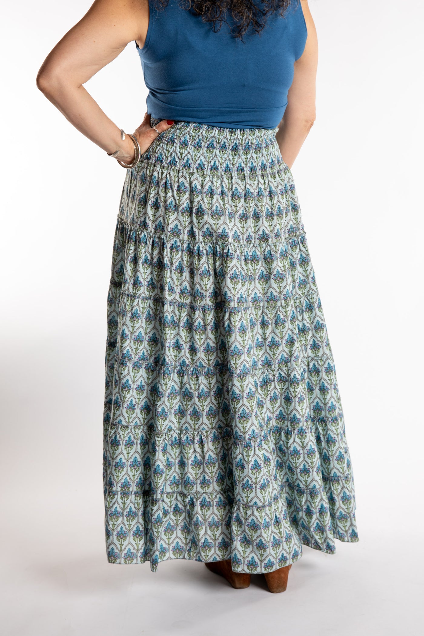 Susan is wearing the one size Indira Prairie Skirt in Trellis