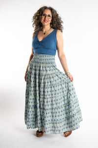 Susan is wearing the one size Indira Prairie Skirt in Trellis