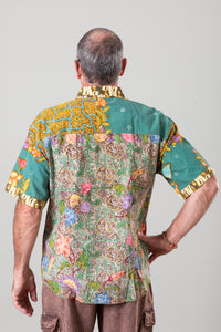 Ross is wearing the size L Patchwork button down shirt