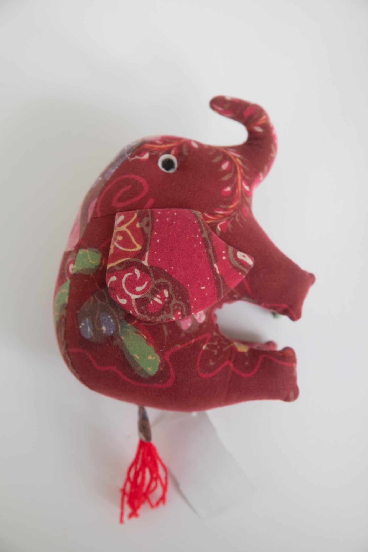 Assorted multicolor elephant plush toy with floral patterns