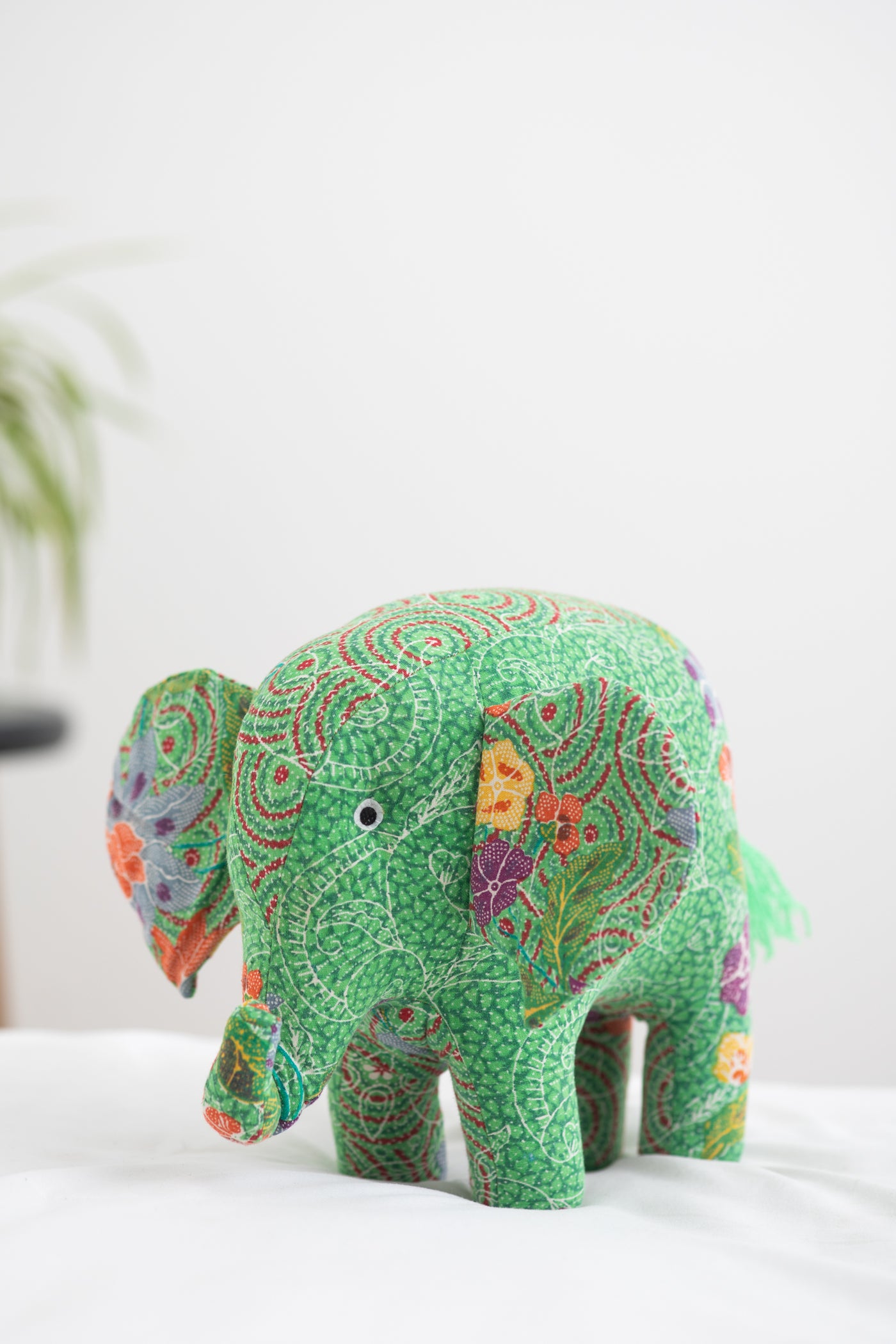 Assorted multicolor elephant plush toy with floral patterns