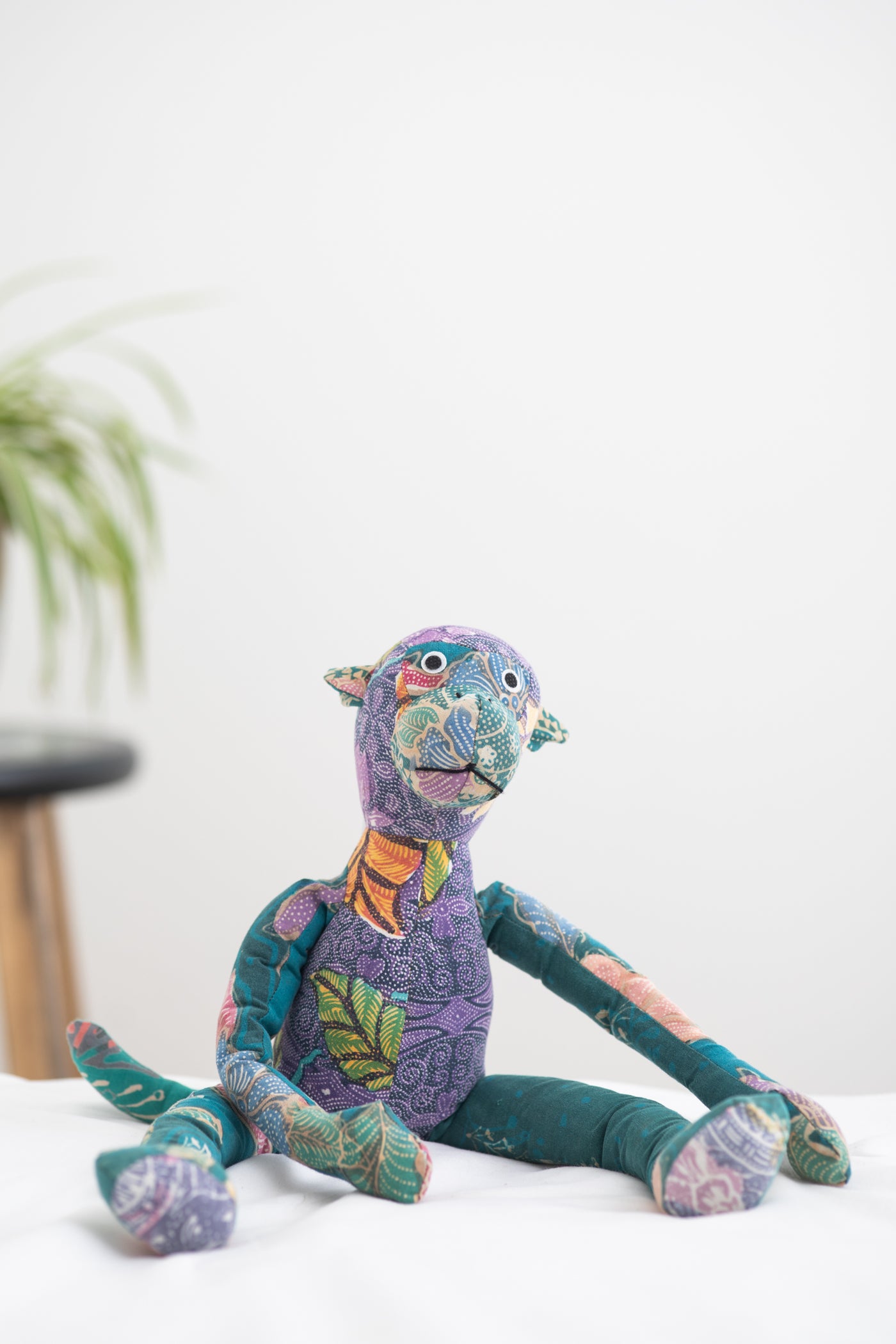 Assorted multicolor patchwork stuffed monkey