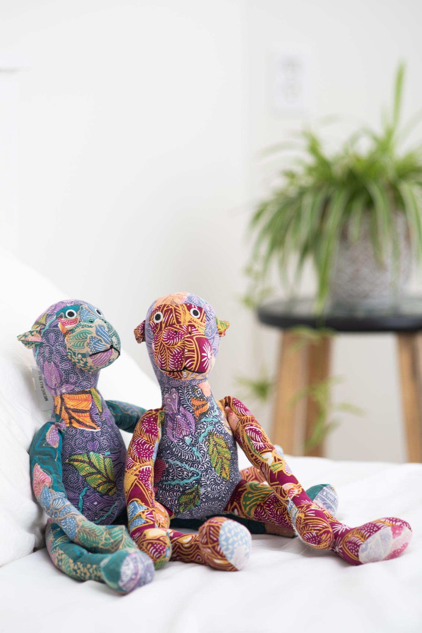 Assorted multicolor patchwork stuffed monkeys