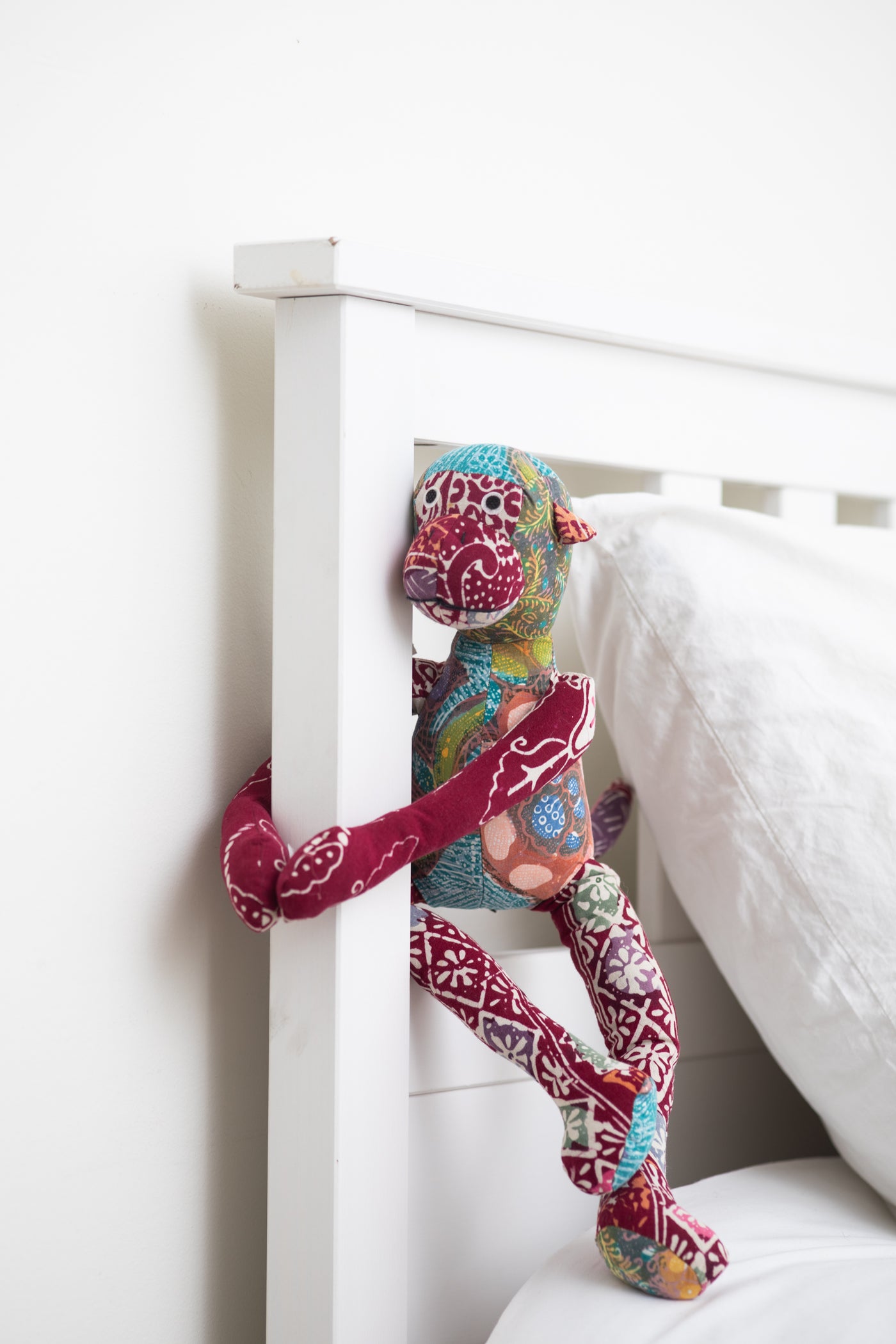 Assorted multicolor patchwork stuffed monkey