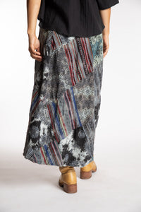 Sophie is wearing the Black Jaya Patchwork Utility Wrap Skirt in S/M