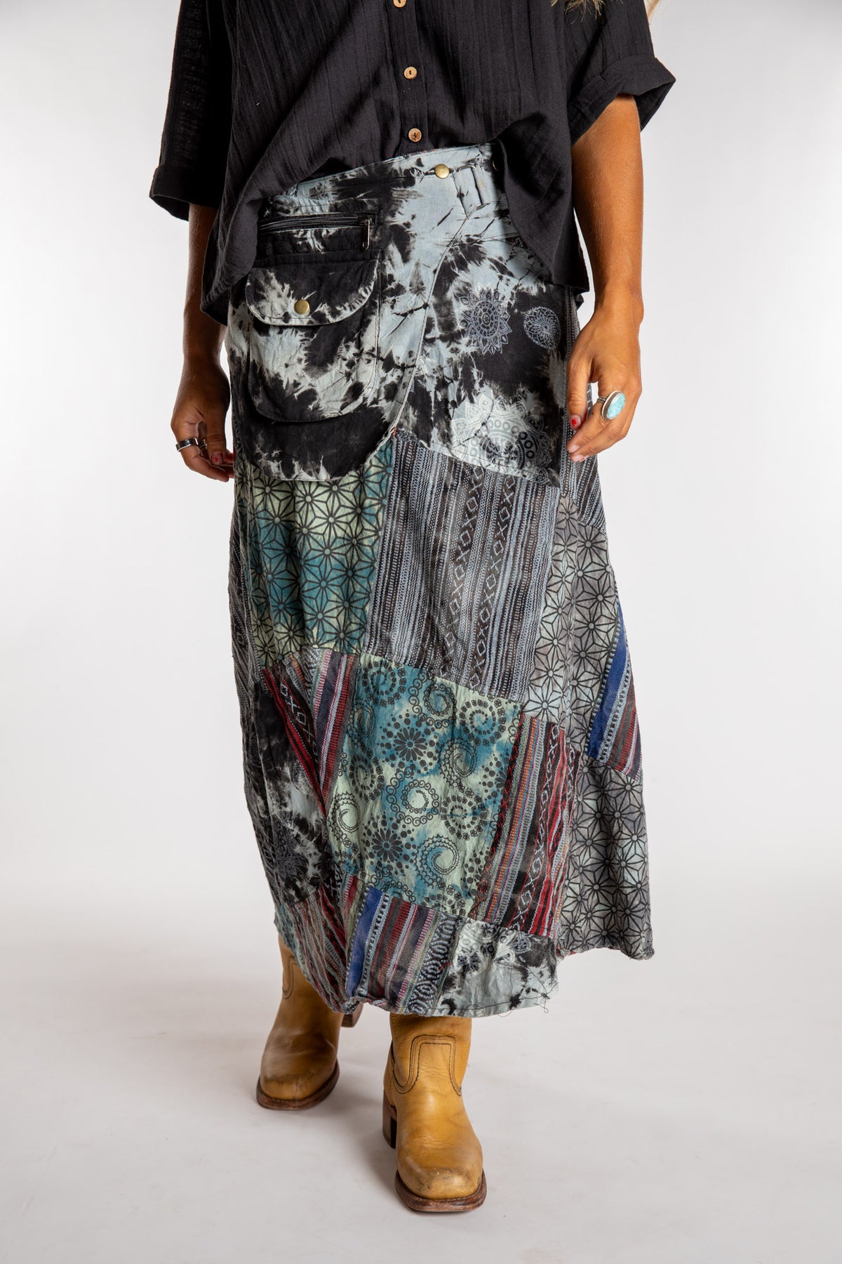 Sophie is wearing the Black Jaya Patchwork Utility Wrap Skirt in S/M