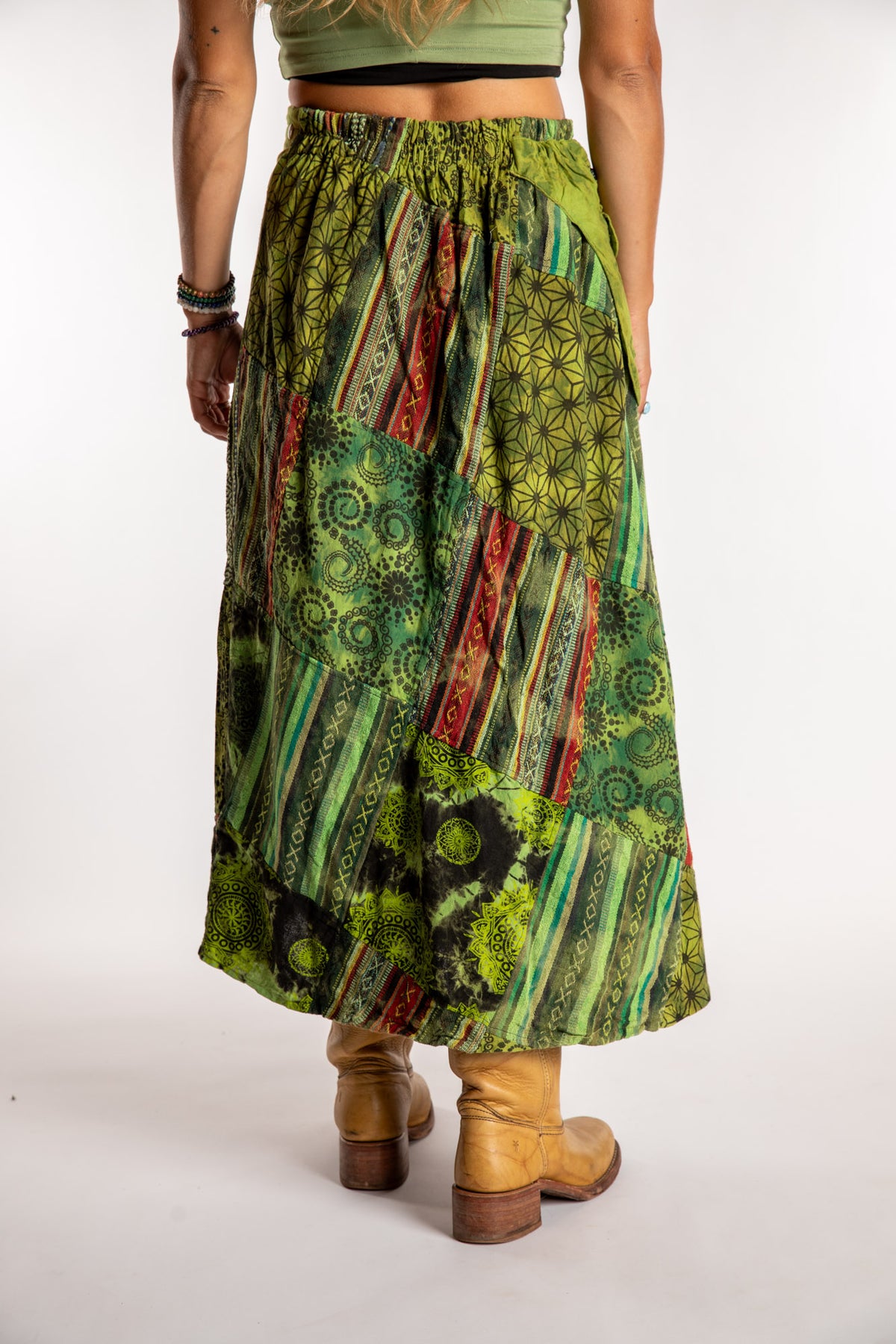 Sophie is wearing the Green Jaya Patchwork Utility Wrap Skirt in S/M