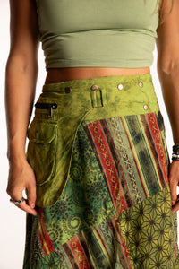 Sophie is wearing the Green Jaya Patchwork Utility Wrap Skirt in S/M