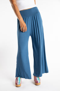Sophie is wearing S/M Wide Leg Pants in Blue Ocean