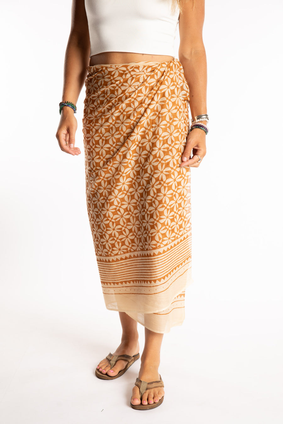 Sophie is wearing the Kala Cotton Sarong in Rust