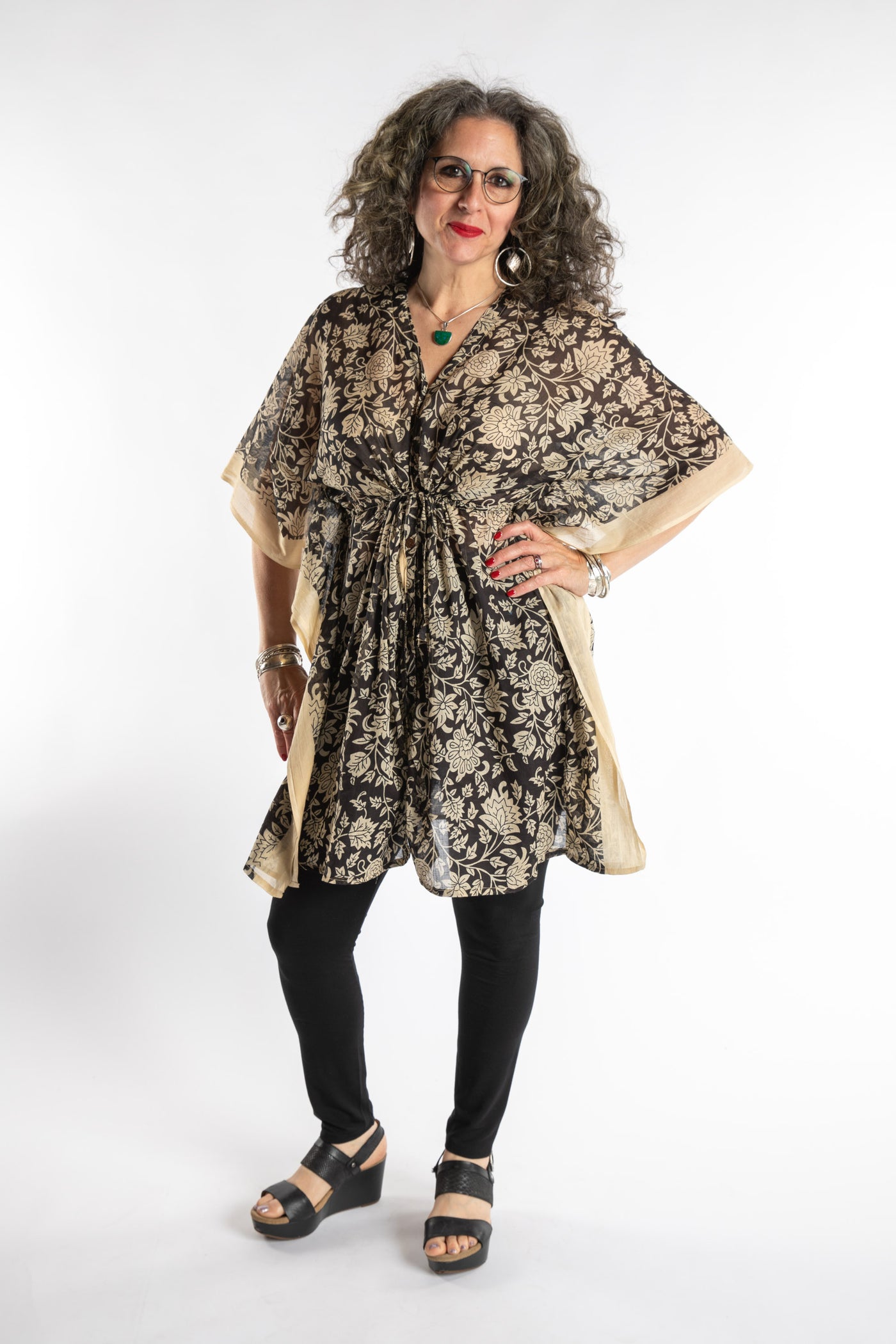 Susan is wearing the one size Kala Printed Cover Up in Black