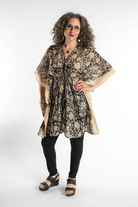 Susan is wearing the one size Kala Printed Cover Up in Black