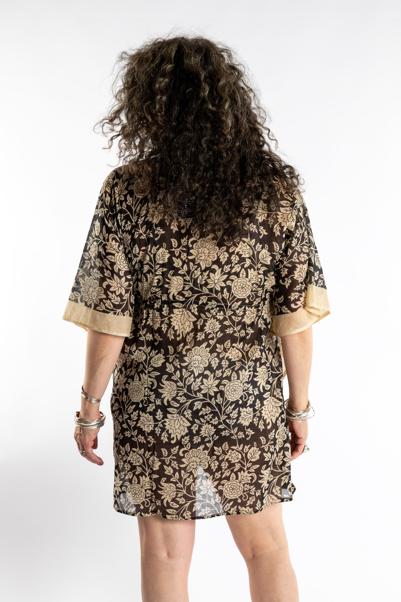 Susan is wearing the one size Kala Printed Cover Up in Black