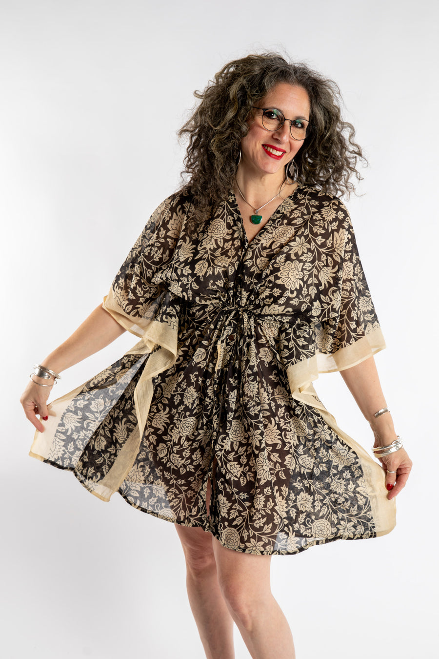 Susan is wearing the one size Kala Printed Cover Up in Black