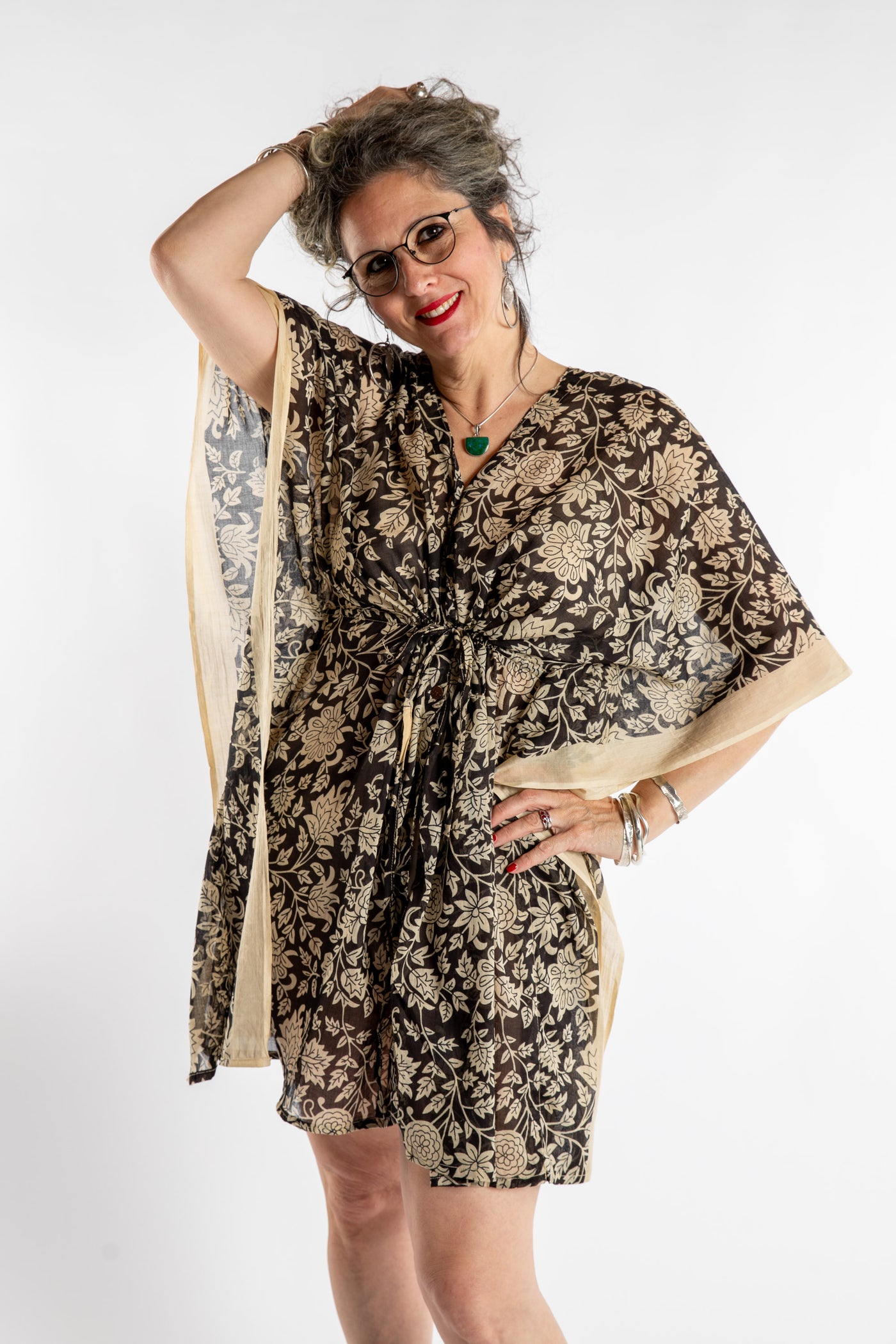 Susan is wearing the one size Kala Printed Cover Up in Black