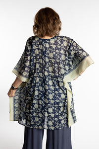Betty is wearing the one size Kala Printed Cover Up in Blue