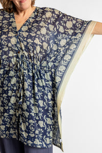 Betty is wearing the one size Kala Printed Cover Up in Blue
