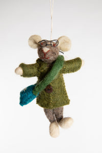 A felted mouse ornament with glasses and an olive green jacket and teal satchel