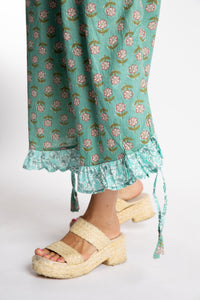 Sophie is wearing the Kiraana Tonal Crop Pants in Aquamarine S/M