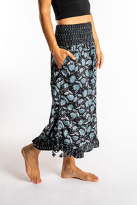 Sophie is wearing the Kiraana Tonal Crop Pants in Black S/M