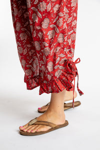 Sophie is wearing the Kiraana Tonal Crop Pants in Red S/M