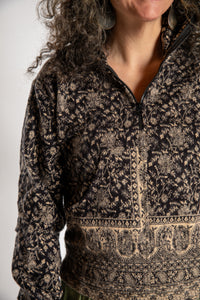 Susan is wearing the M/L Kiran Soft Brushed Quarter Zip Pullover in Black 