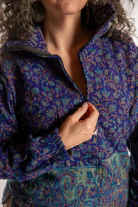 Susan is wearing the M/L Kiran Soft Brushed Quarter Zip Pullover in Blue