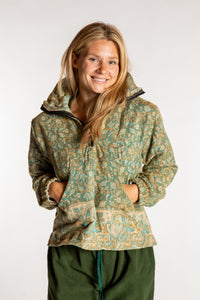 Sophie is wearing the S/M Kiran Soft Brushed Quarter Zip Pullover in Green