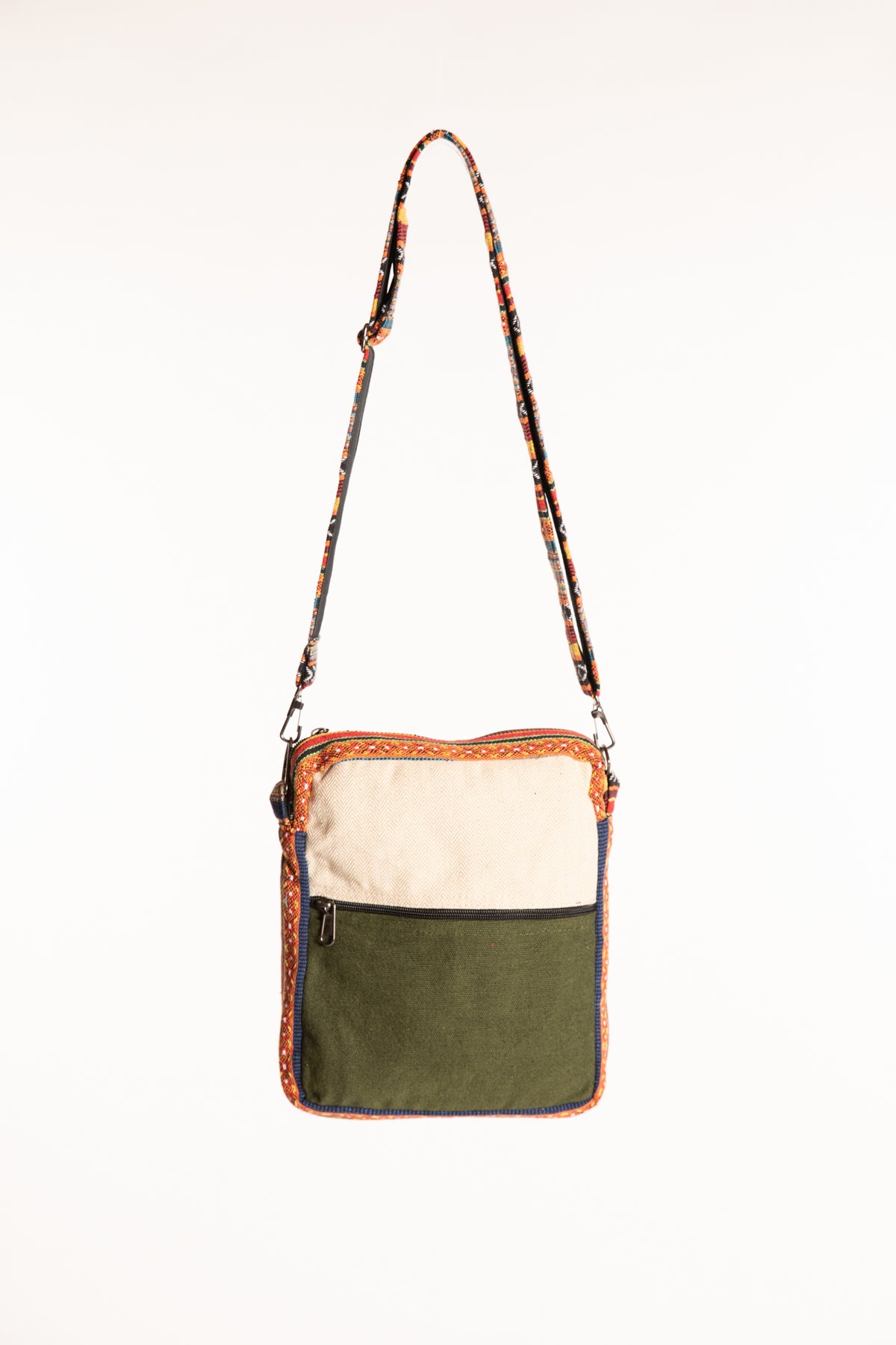 Back view of hemp crossbody bag with green fabric panel and contrasting cream trim