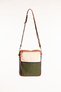 Back view of hemp crossbody bag with green fabric panel and contrasting cream trim