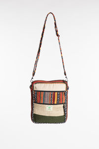 Koshi hemp patchwork crossbody bag with colorful striped panel, cream fabric and green accents