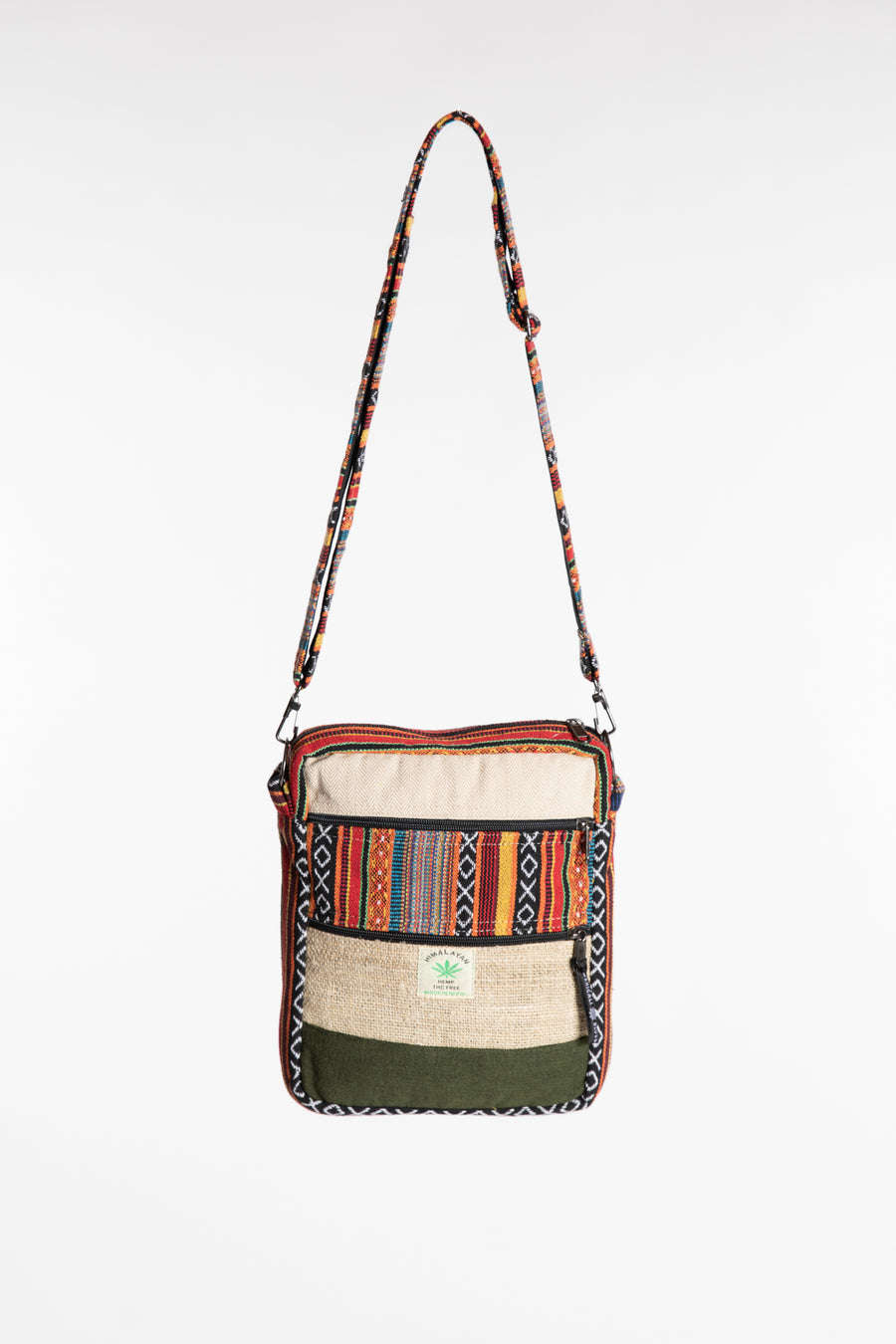 Koshi hemp patchwork crossbody bag with colorful striped panel, cream fabric and green accents