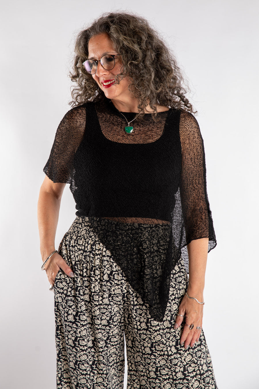 Susan is wear the Magic Lightweight Capelet in Black