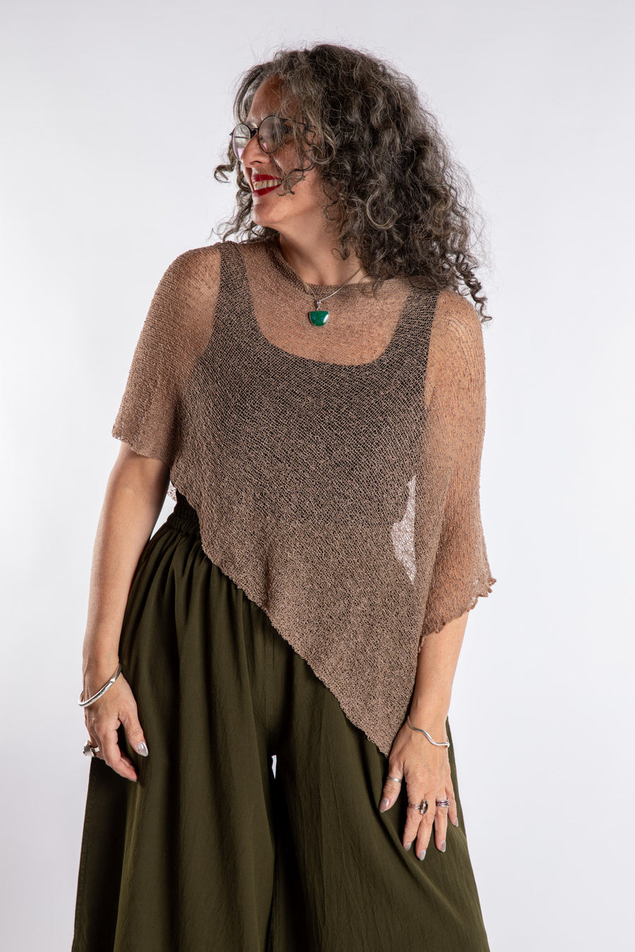 Susan is wear the Magic Lightweight Capelet in Brown