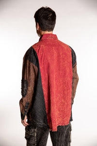 Topher is wearing the One Size Makalu Patchwork Overshirt in Spice Harvest