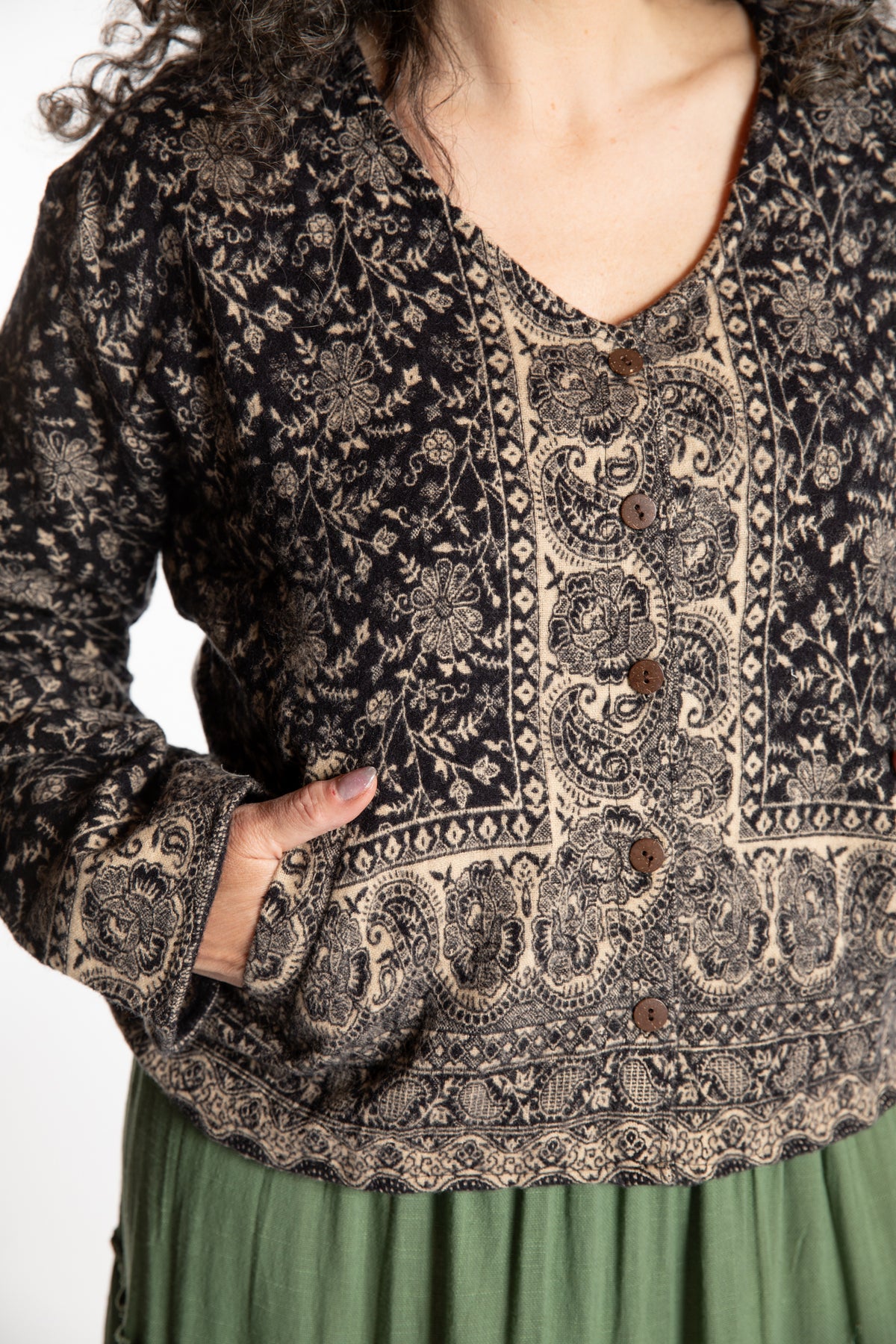 Susan is wearing the M/L Malini Soft Brushed Cardigan in Black
